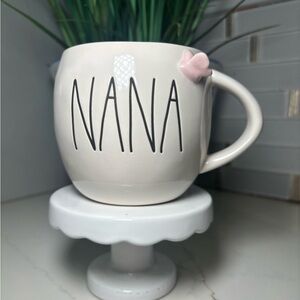Rare Rae Dunn "NANA" mug, featuring a signature whimsical font pink 3D butterfly